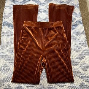 Orange Velour Disco type pants .